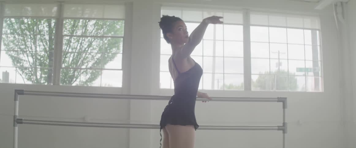 A woman practices ballet