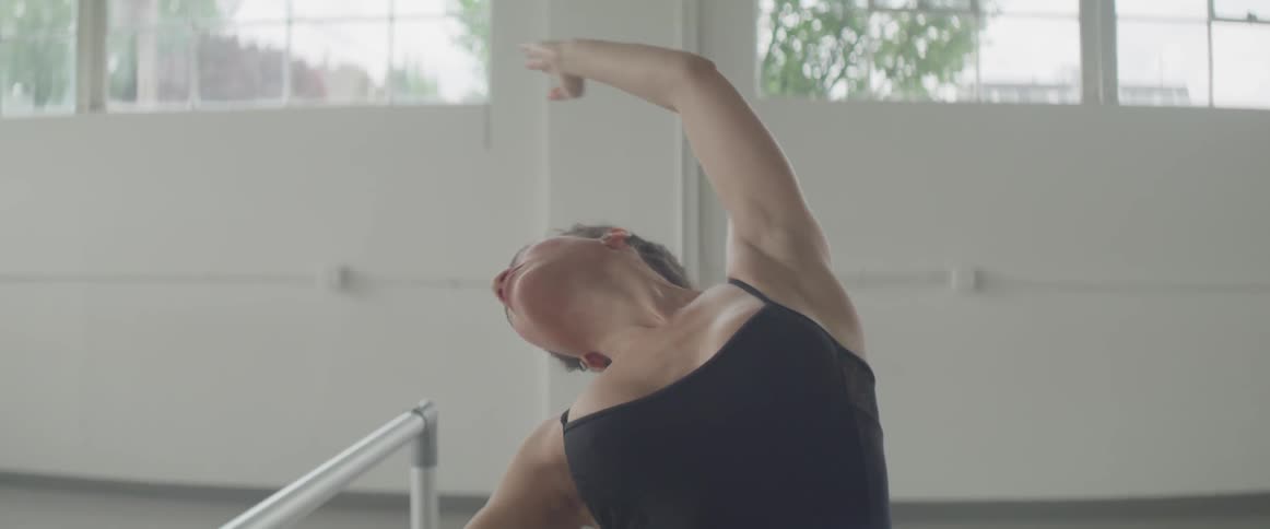 A dancer stretches