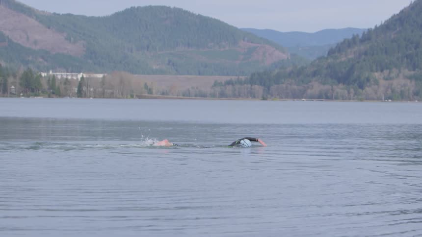 A person swims in the water