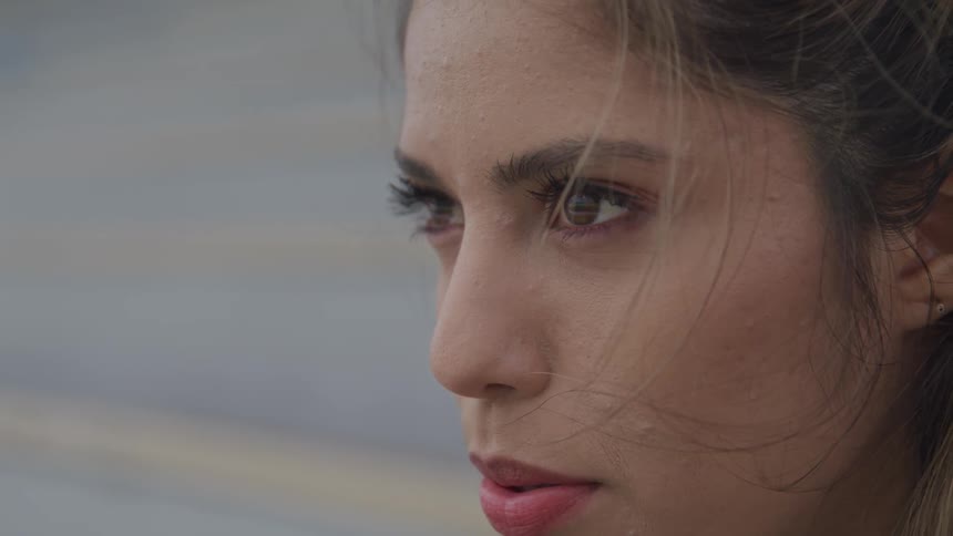 A woman looks into the distance