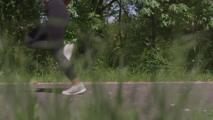 A woman runs on a path