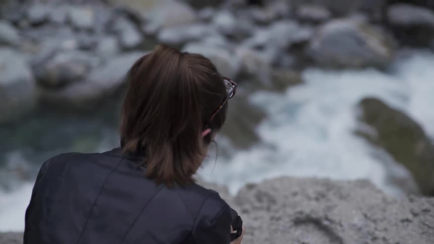 Person Photographing Scenic Nature Landscape Outdoors During Peaceful Daytime.