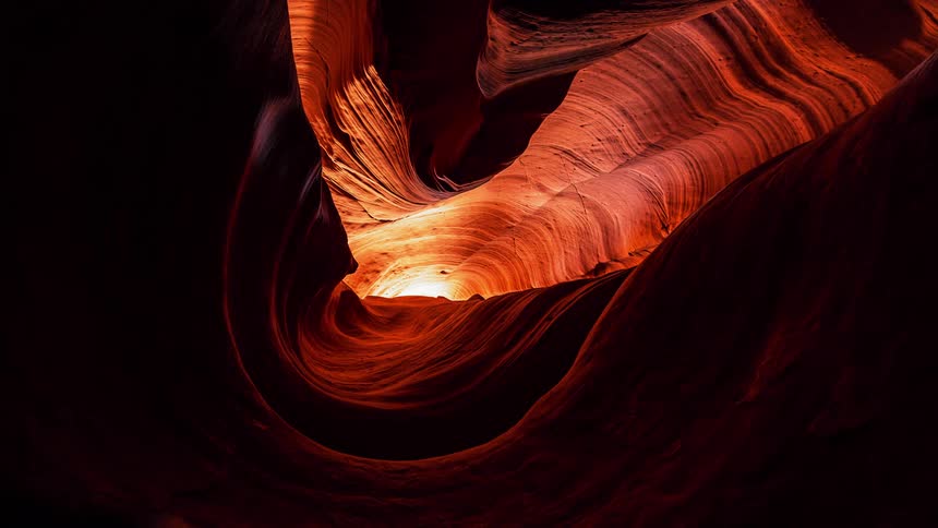 Sunlight highlights the lines inside a cave