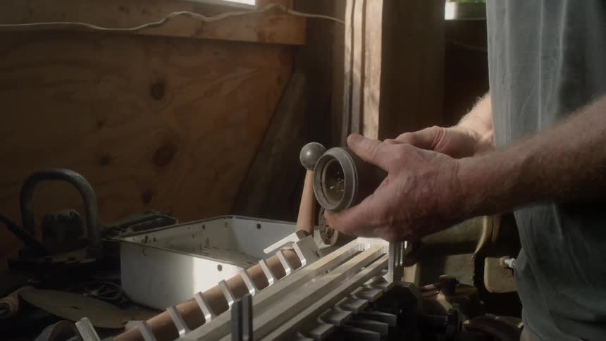 Man customizing camera lens
