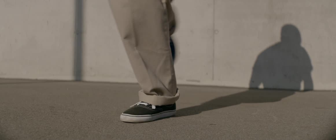 A man dances in the street