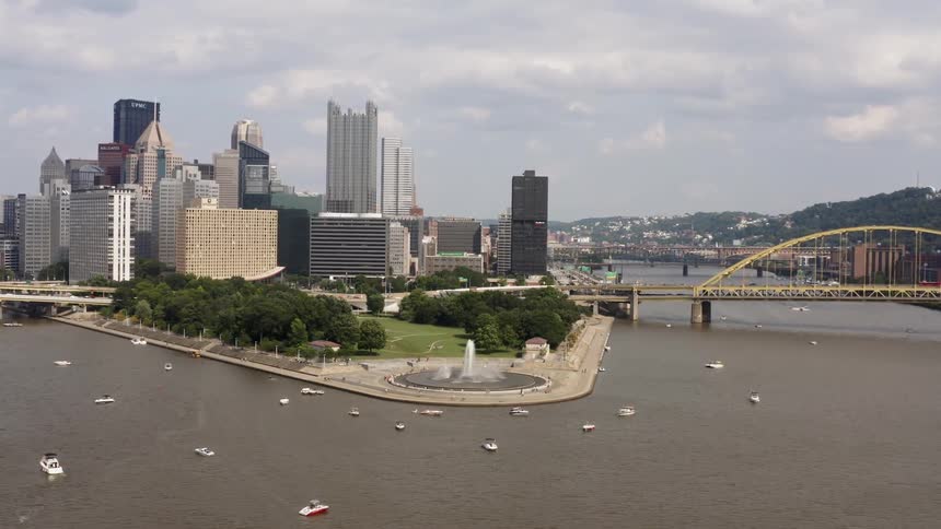An aerial shot of a city with a river