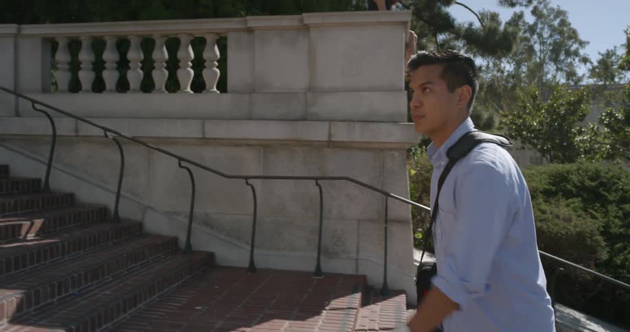 A man walks up the stairs