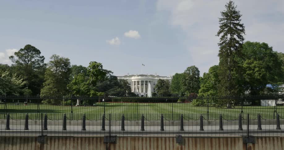 The white house stands in the distance