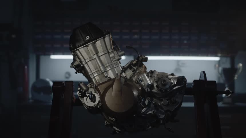 An engine sits on a saw horse