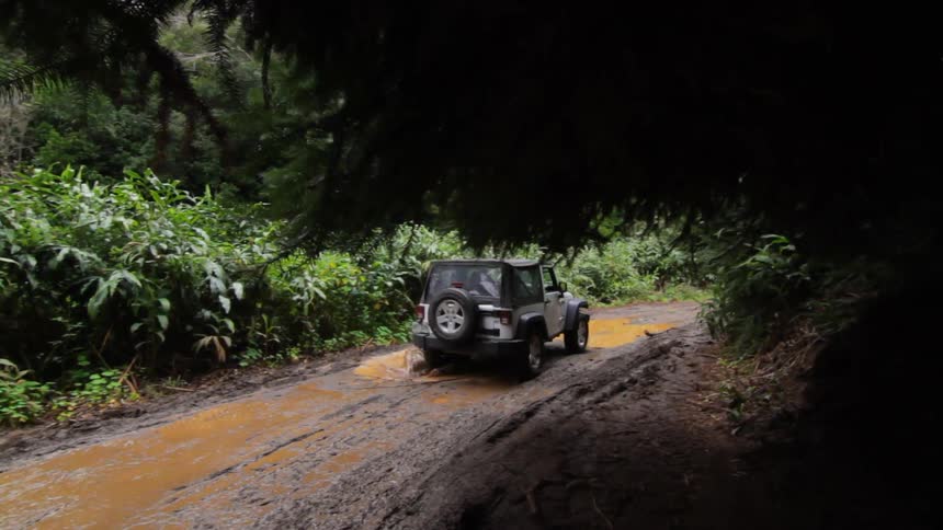 A jeep driving away
