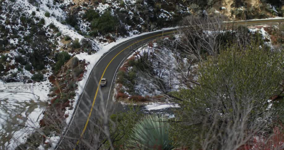 Car driving down a road