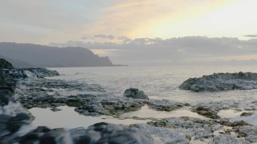 Waves crash on a rocky shore line