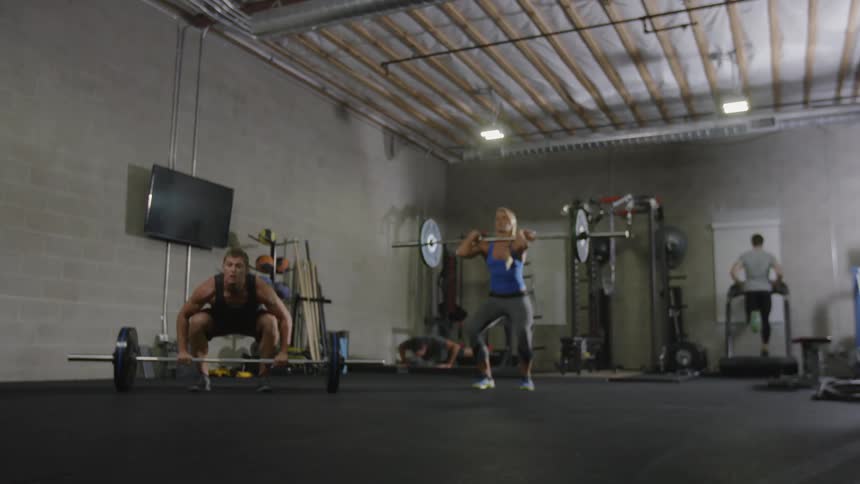 People are working out in a gym