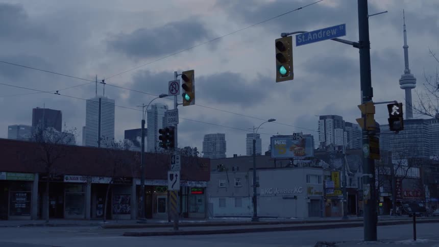 An urban neighborhood with little traffic outside of a large city