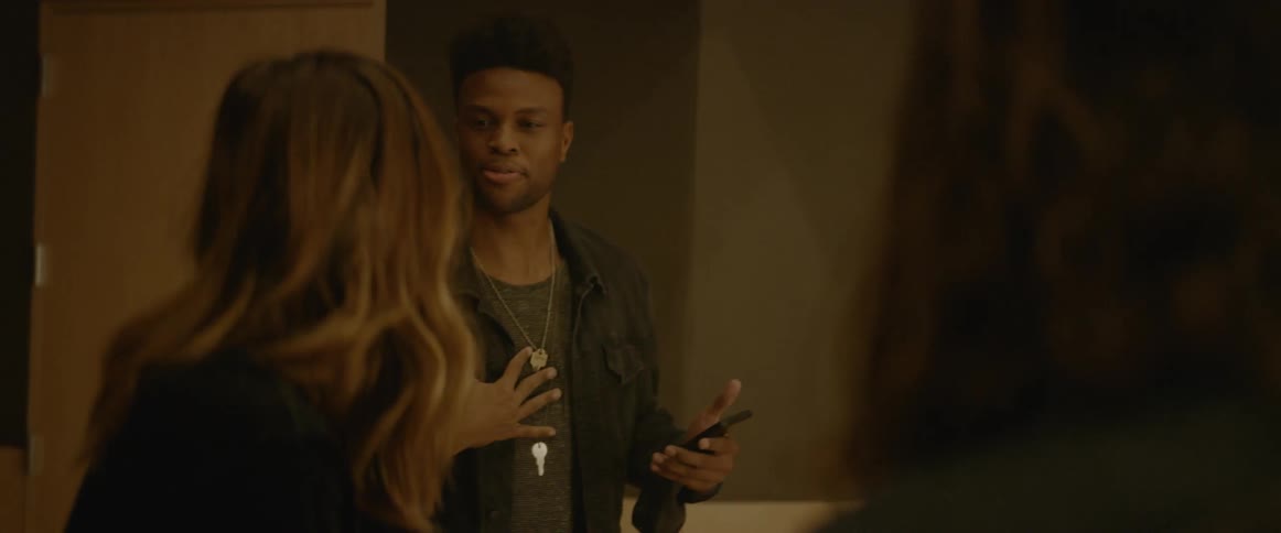 People are talking together in a house