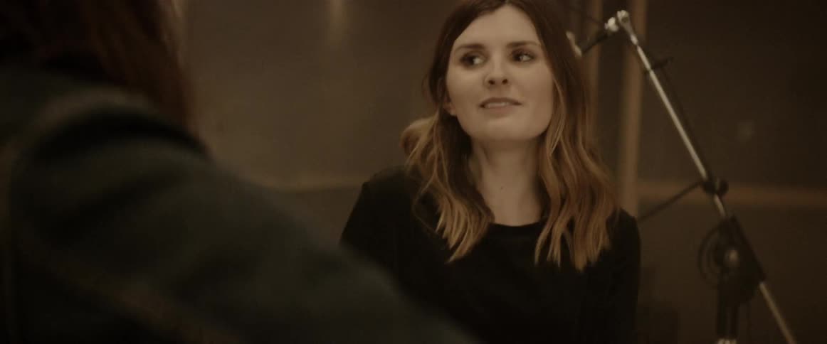 Female explaining something to her friend