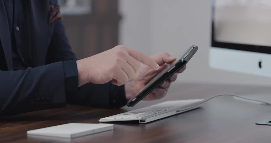 Someone works on a tablet