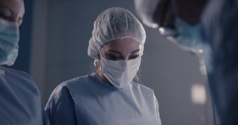 Doctors working on a paitent
