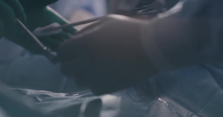Doctors are performing surgery in an operating room