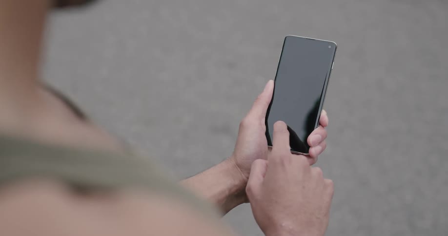Someone scrolling on their cell