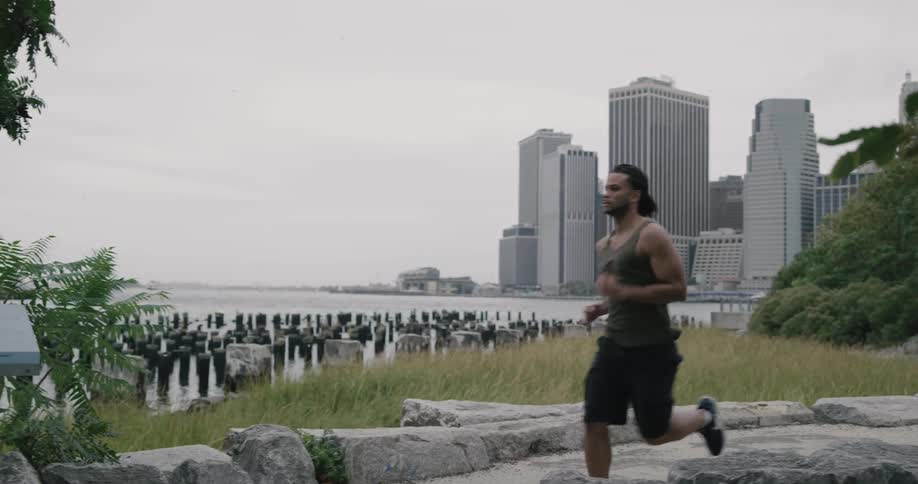 A man is jogging outdoors