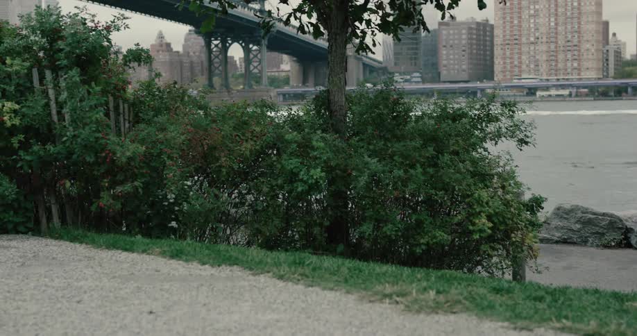 A woman is jogging outdoors