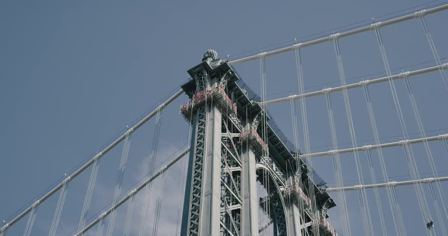 The bridge goes high into the clear sky
