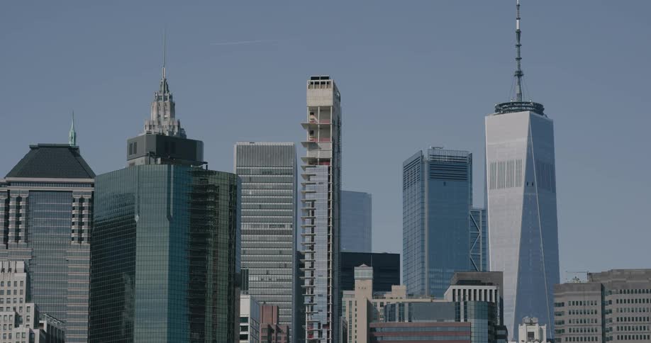 Large buildings stand over a city