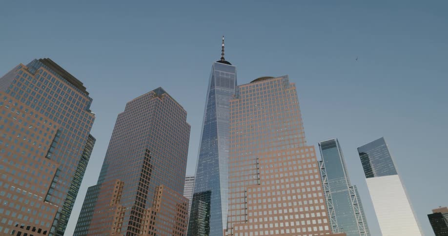 Tall skyscrapers tower overhead in a downtown urban area