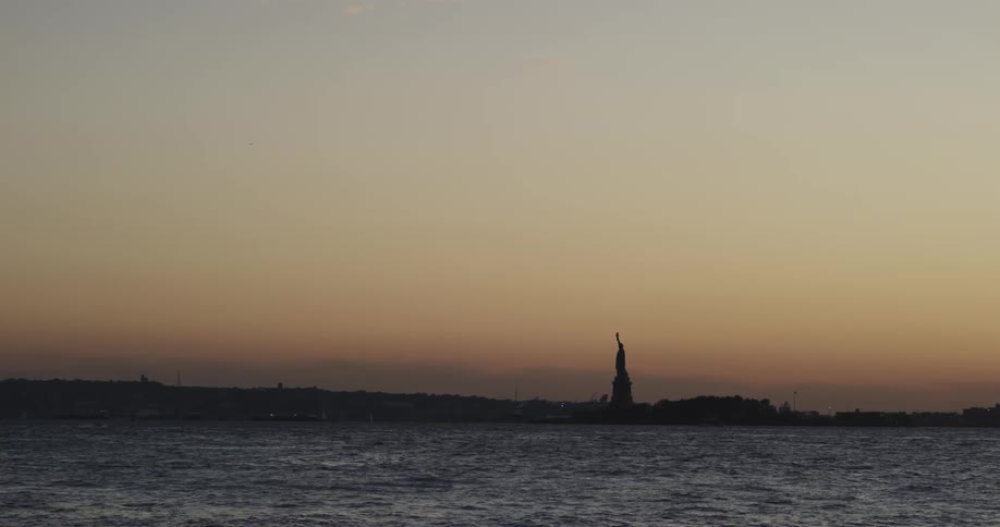 Statue of liberty overlooking water