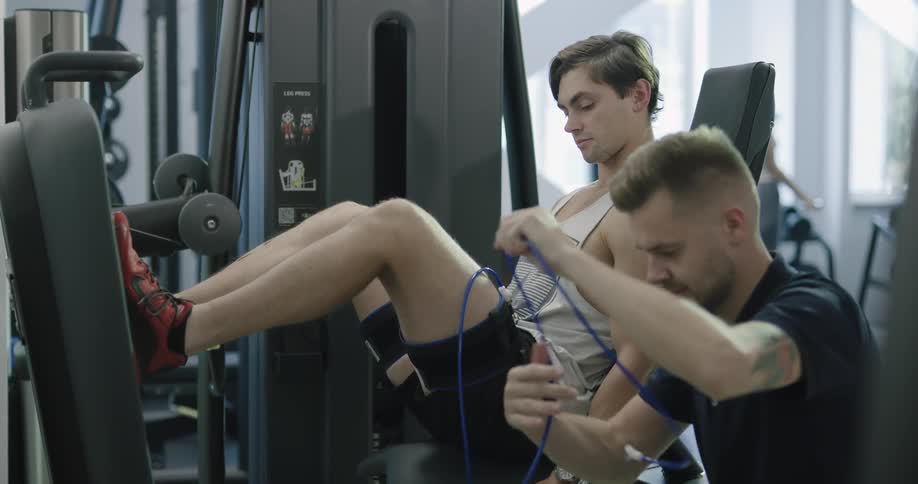 A man is working out in a gym
