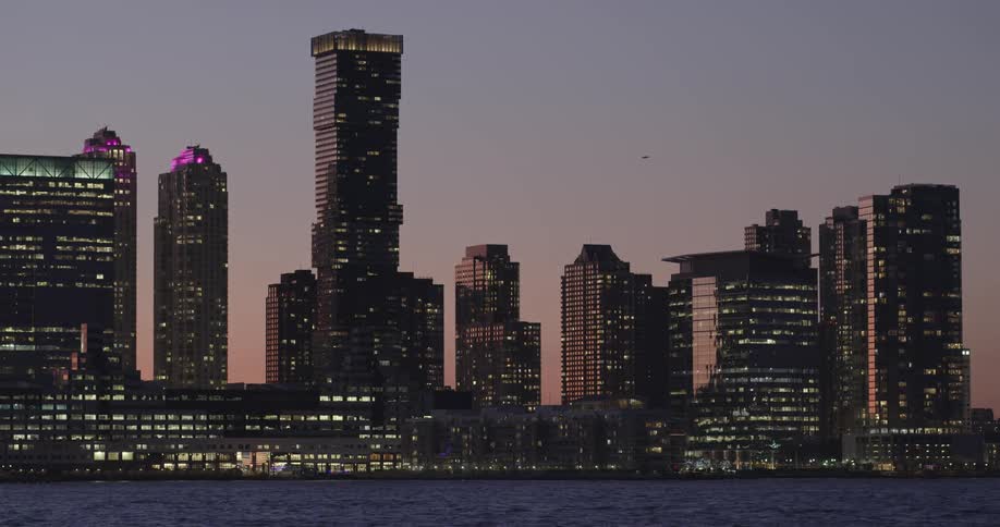 High rises and skyscrapers in a city during dusk