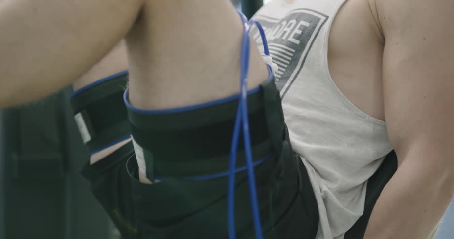 A man is working out in a gym