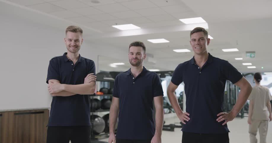3 man posing for the camera