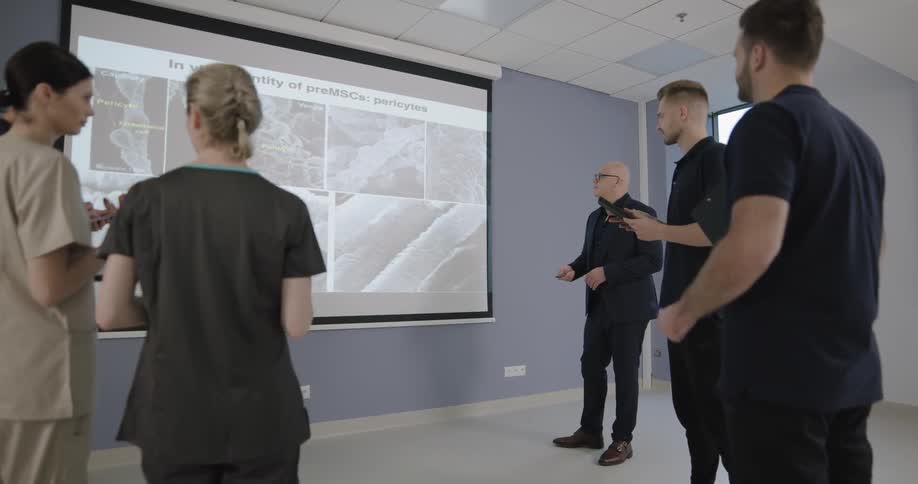 A crowd listening to a presentation