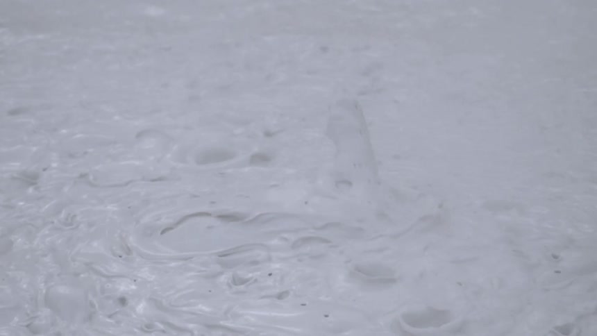 Bubbling white thick liquid