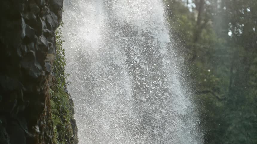 A waterfall crashed down the side of a hill