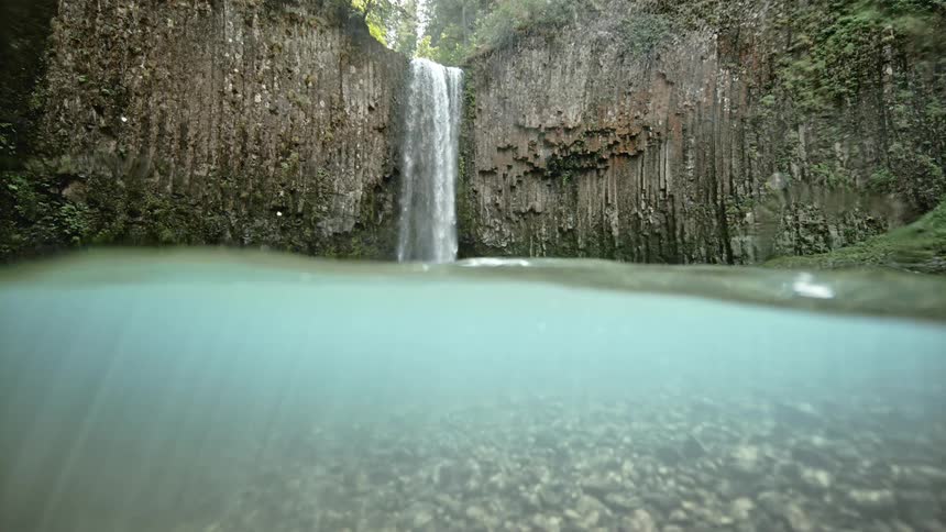 A footage of a waterfall and underwater