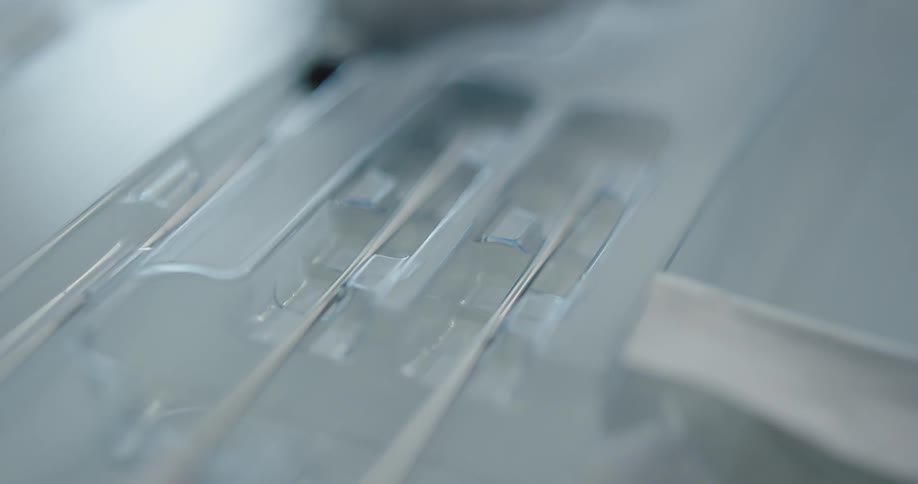 Medical equipment sits in plastic packaging