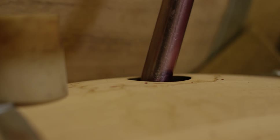 A rod entering a hole