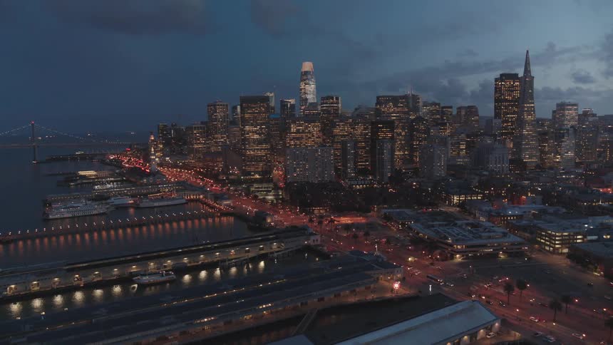 Skyline view of a harbour and the city at night