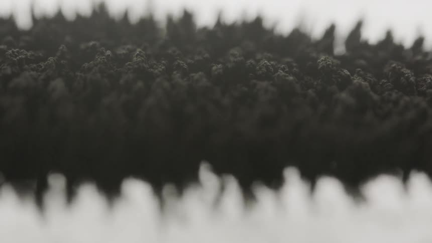 An abstract footage of a dark bubbly things