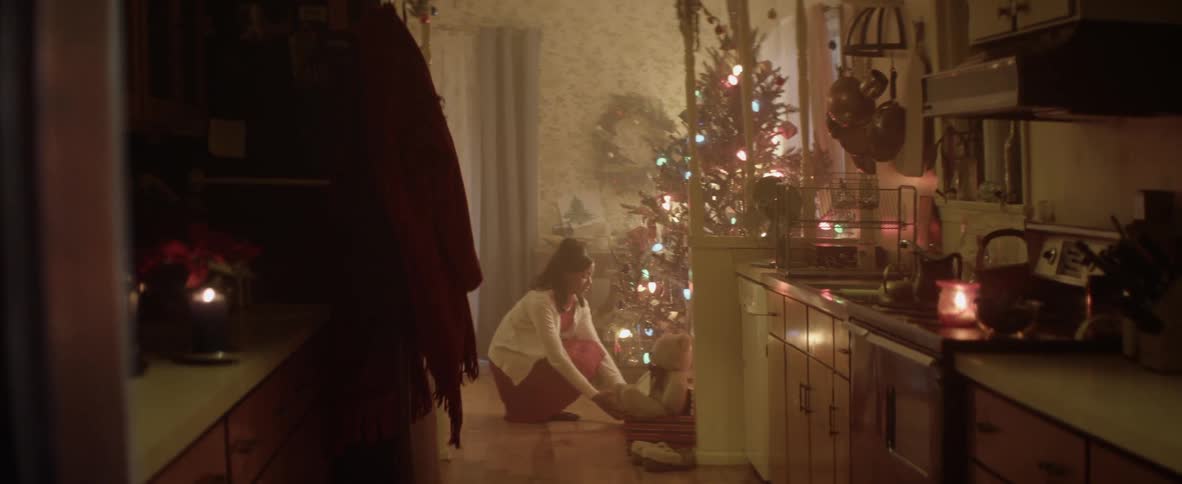 Mother preparing gift for christmas