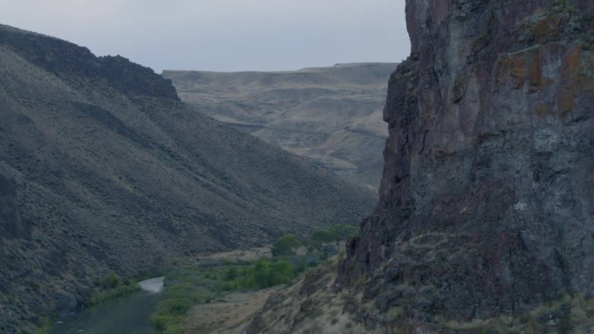 Landscape view of a river and road between hills