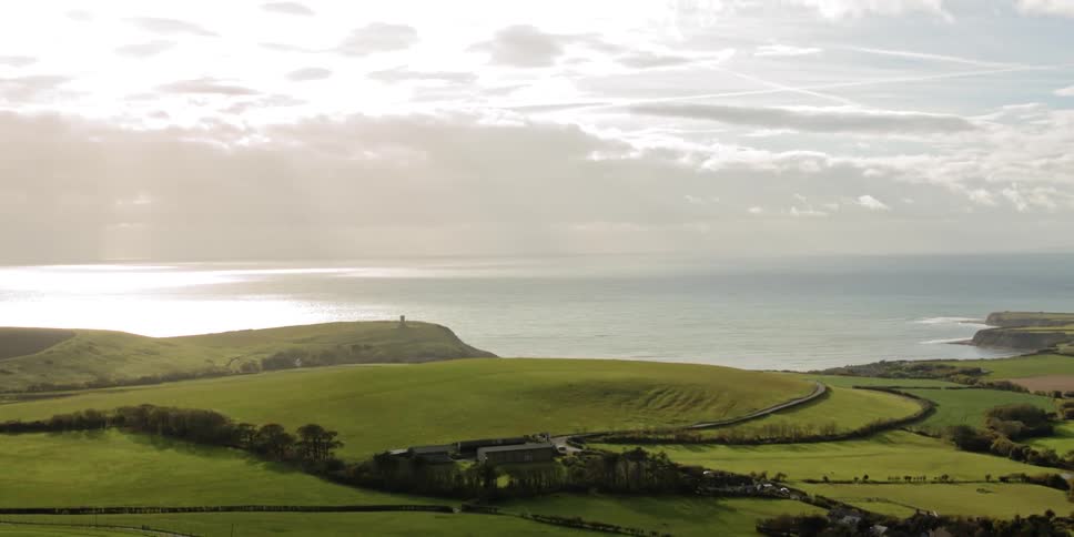 Green fields of grass near the sea