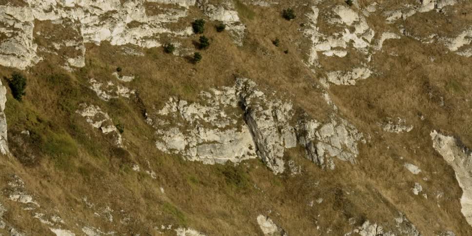 An aerial view of a rocky mountain