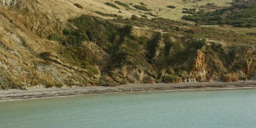 Landscape view of the water and the hills beyond it