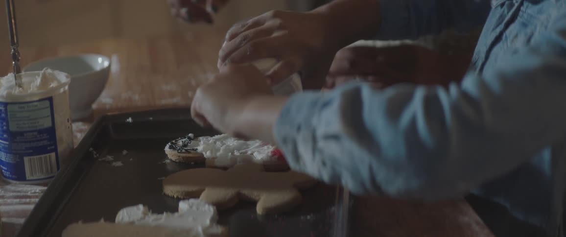 Kid cook a ginger bread cookie
