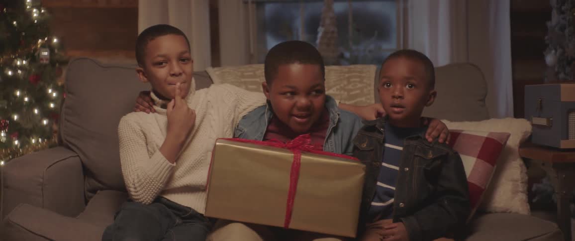 Kids getting ready to open present