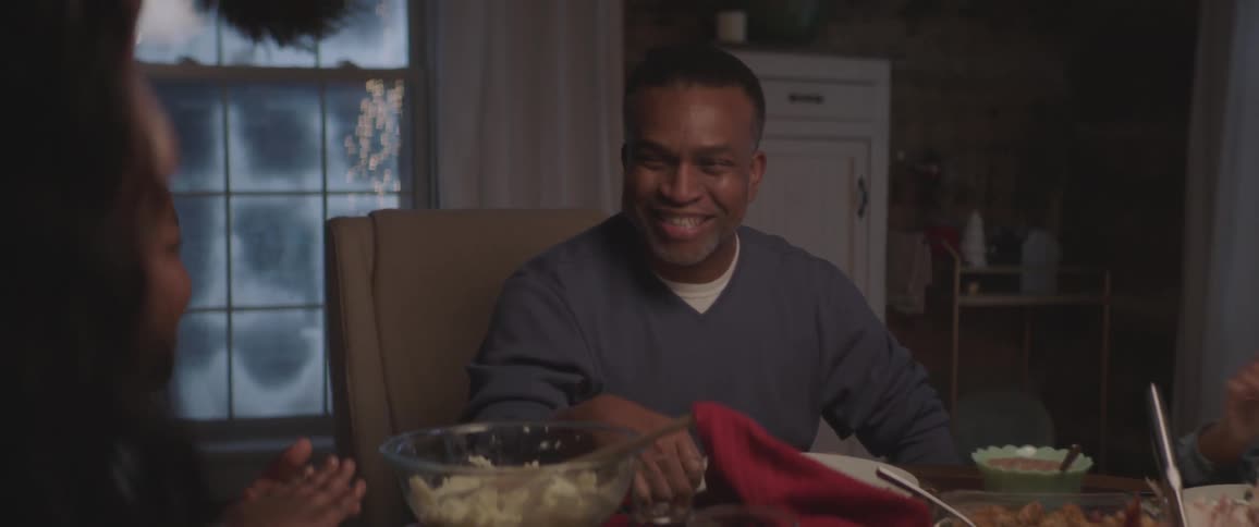 Family enjoying themselves during thanksgiving dinner